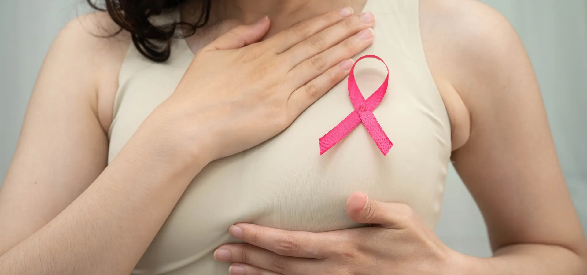 High-resolution breast oncology / doctor-patient consultation image. Minimum 1920 × 900 px, JPG/PNG.